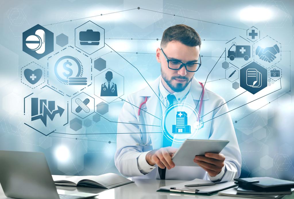 Male doctor looking at a tablet with digital medicine-related icons around him